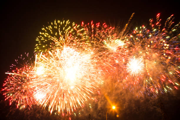 istock brigh tmulti-colored fireworks in the night sky 1964513786