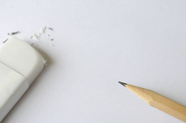 istock Top view of eraser and pencil on white cover background with customizable space for text 1964517036