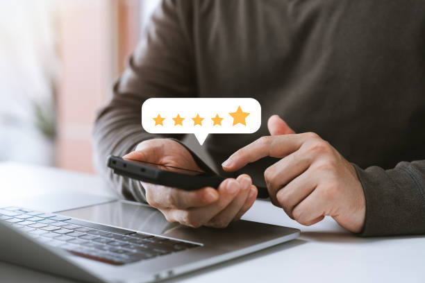 istock customer satisfaction survey concept business people use smartphone Touch the happy smiley icon. Satisfied. 5 stars. Service experience rating. online application Satisfaction Review best quality. 1964520172