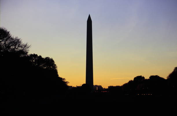 istock Washington Monument silhouette  during sunset in Washington, DC. 1964531598