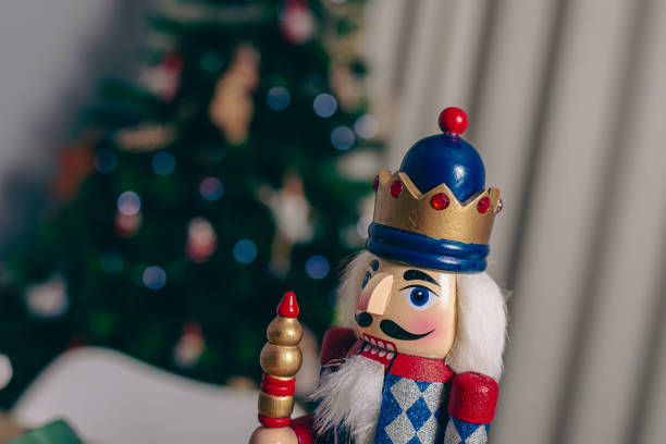 istock Beautiful blue nutcracker made of wood solider guard Christmas decoration on a interior holidays scene 1964564231