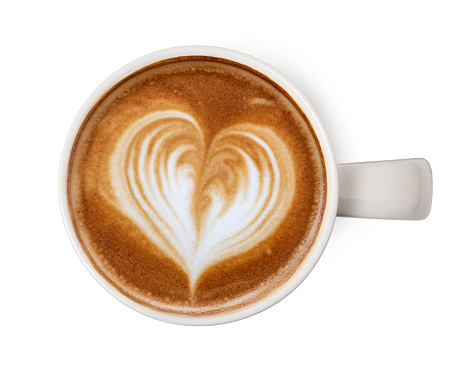 Top view of coffee latte art cup with froth heart shaped isolated on white background