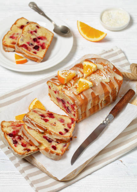 istock orange cranberry loaf with orange glaze, top view 1964652625