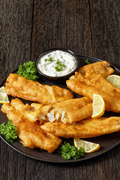 istock deep fried crispy beer batter fish fillet on plate 1964653176