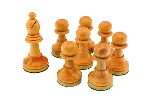Chess figures, bishop and pawns, gathered together. Group, teaching or teamwork concept.