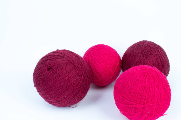 istock Knitting yarn for knitting on white background. red. 1964699932