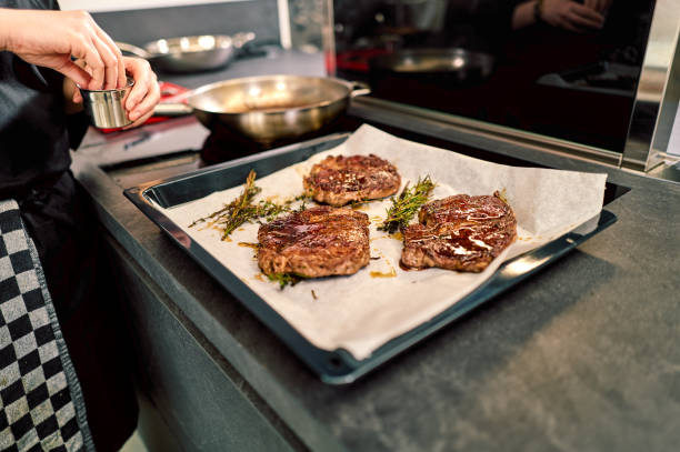 steak is cooking on the stove