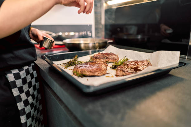 steak is cooking on the stove