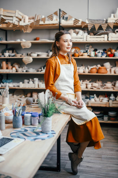 istock Resting woman potter in her workshop 1964717426