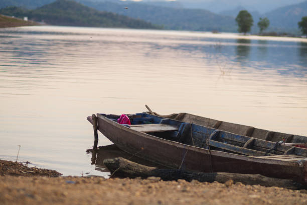 Old Fishing Boat Drifting on River