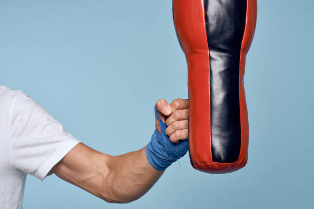 istock Punching bag punch training boxing exercise bandages 1964736079