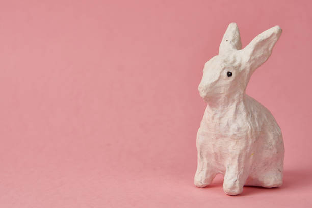 istock Easter bunny on a pink background toy animal holidays 1964791522