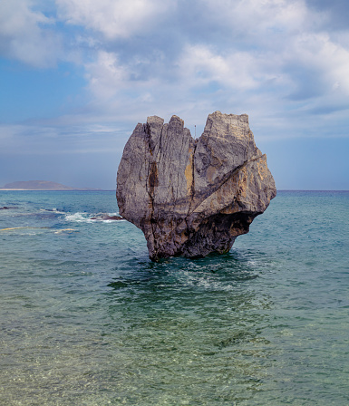 Rock in heart shape in the sea, Preveli Beach, Crete, Greece