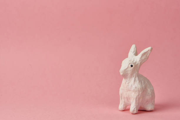 istock Easter bunny on a pink background toy animal holidays 1964795814