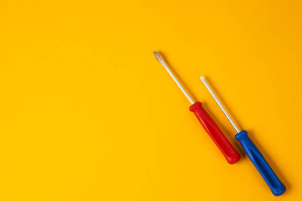 istock screwdrivers and construction tools on yellow background equipment for repair industry 1964796219