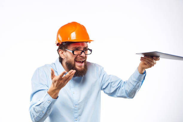 emotional worker orange paint safety construction industry cropped view. High quality photo