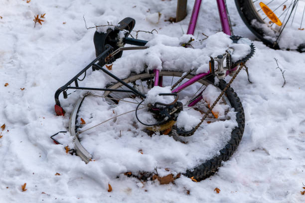 istock a fallen bicycle in winter in the snow 1964855815