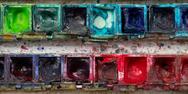 istock Palette with colorful artist paints 1964861158