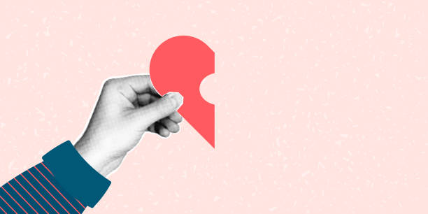 istock A hand holds a puzzle in the shape of half a heart 1964865877