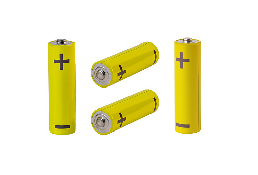 AA batteries composition. Yellow cylinders isolated on white