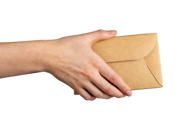 istock Hands giving paper box, delivery package, order in cardboard isolated on white 1964897824