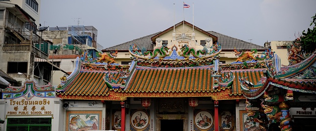 November 4 2023, Bangkok, Thailand : Ancient Chinese temple roof structures captured in Song wat road, Bangkok.