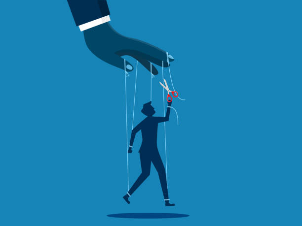 istock Freedom from being manipulated. Businessman puppeteer uses scissors to cut control wires 1964997098