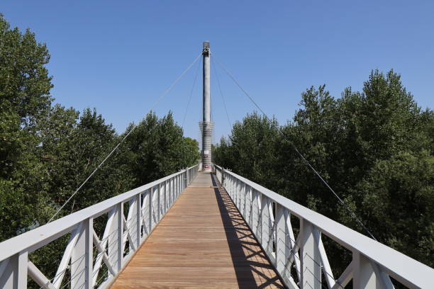 istock Agen - Suspended footbridge on the Garonne river 1965003516