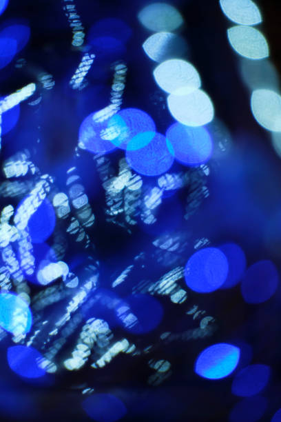 Bright and warm golden light bokeh. Abstract background with colorful bokeh. Christmas. New Year. Happy party
