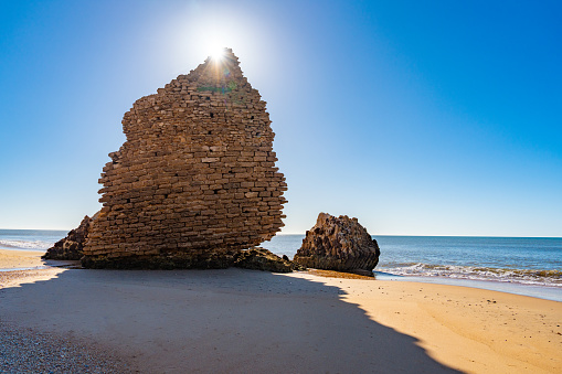 Mazagon beach Torre Rio del Oro old tower ruins in Huelva near Matalascanas of Andalusia Spain