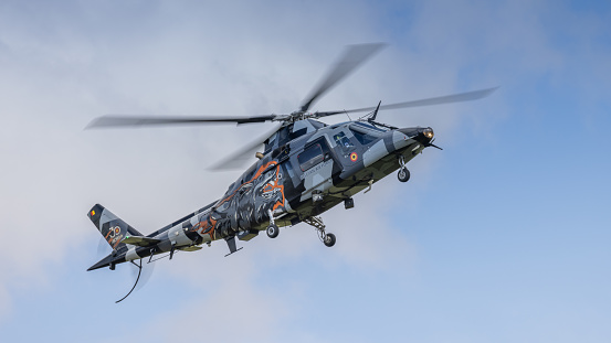 Cosford, UK - 12th June 2022: A H46 Belgian Air Force Agusta A-109HA helicopter flying low to the ground