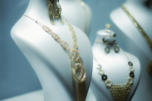 The jewelry set featuring necklaces and earrings displayed elegantly in the store. Brussels, Belgium