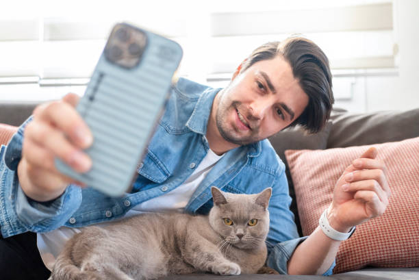 istock Cat with family member 1965073665