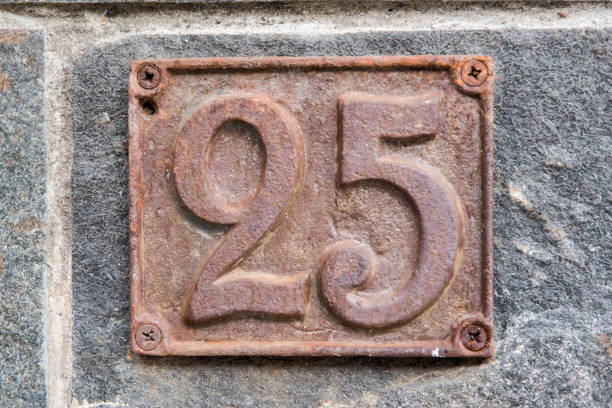 istock Old retro cast iron plate number 25 1965075040