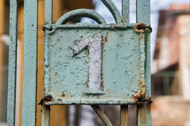 istock Old retro cast iron plate number 1 1965075373