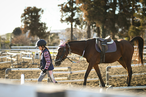 A child enjoying horseback riding