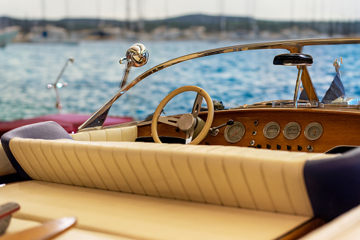 Cockpit of a speedboat and marina