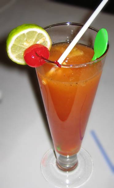 istock Bloody Mary cocktail garnished with a lime slice and a straw 1965077729