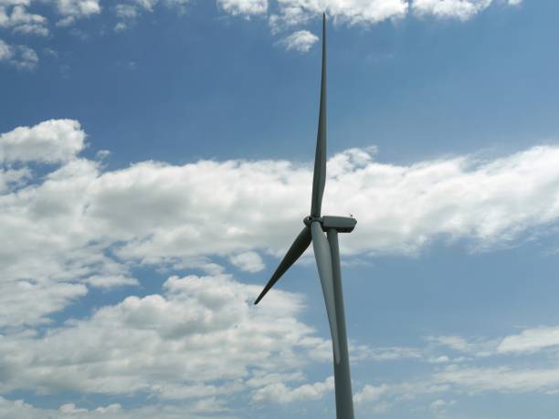 istock An image of windturbine generator under blue sky with clouds 1965084984