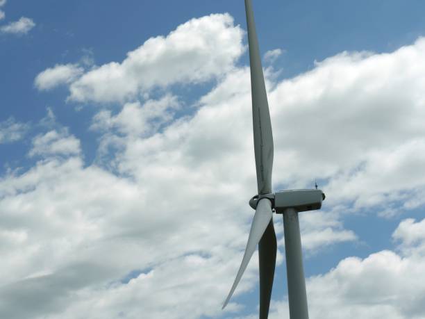 istock An image of wind turbine generator on a cloudy sky background 1965086629