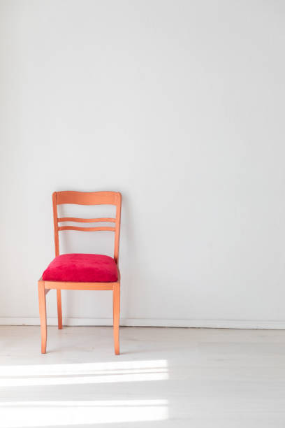 istock red vintage chair in white room interior 1965093661