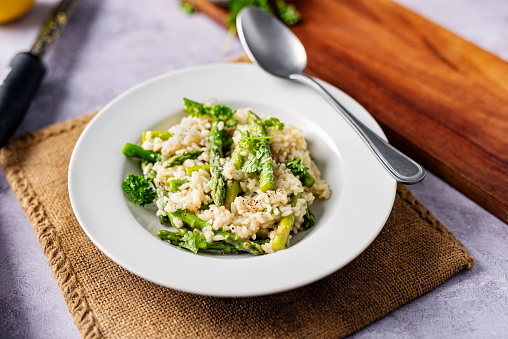 Dish of asparagus risotto. Colour, horizontal format with some copy space.