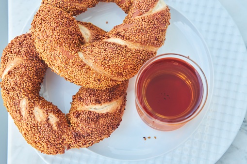 Traditional Turkish breakfast. National food, Turkish tea and semite bun.