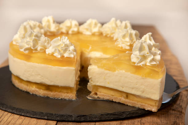 istock Homemade lemon cheesecake cake decorated with whipped cream. 1965153669