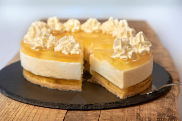 istock Homemade lemon cheesecake cake decorated with whipped cream. 1965154199