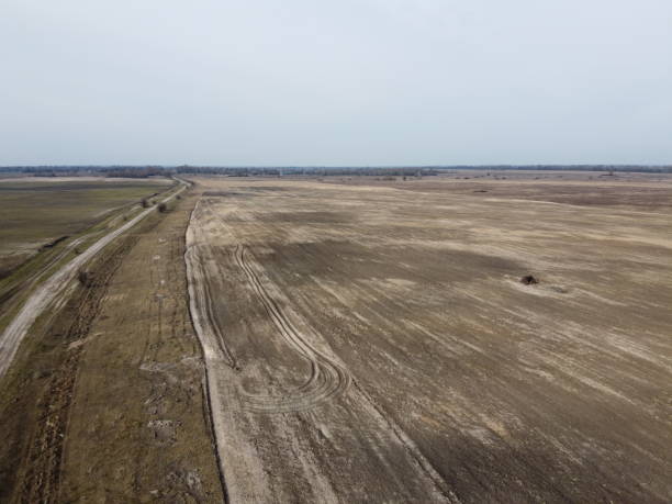 istock Dirt road in the fields, aerial view. Landscape. 1965157904