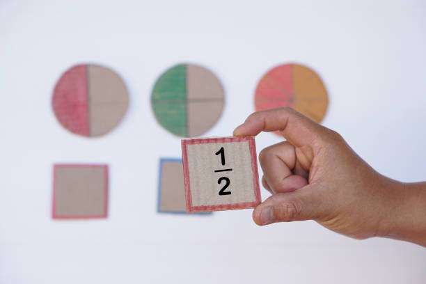 istock Concept, Math teaching. Education. DIY craft as teaching aid in Math subject. Fraction numbers 1965188194