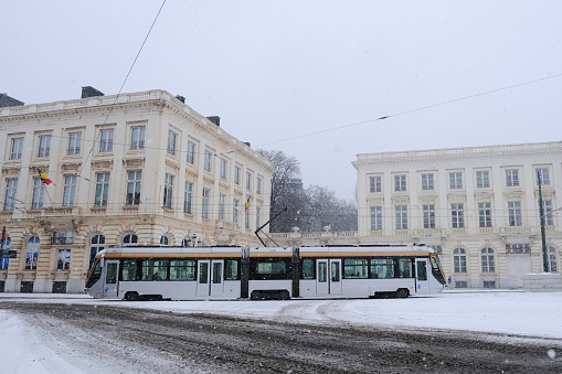 Tram on its way in central Brussels during a heavy snowfall in Belgium on January 17, 2024.
