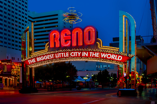 Las Vegas, United States - November 22, 2022: A close-up picture of the STRAT Hotel, Casino and SkyPod and Las Vegas Boulevard Gateway Arches at night.