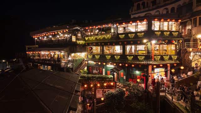 Timelapse of Jiufen town the famous teahouse with many tourists visited in the evening